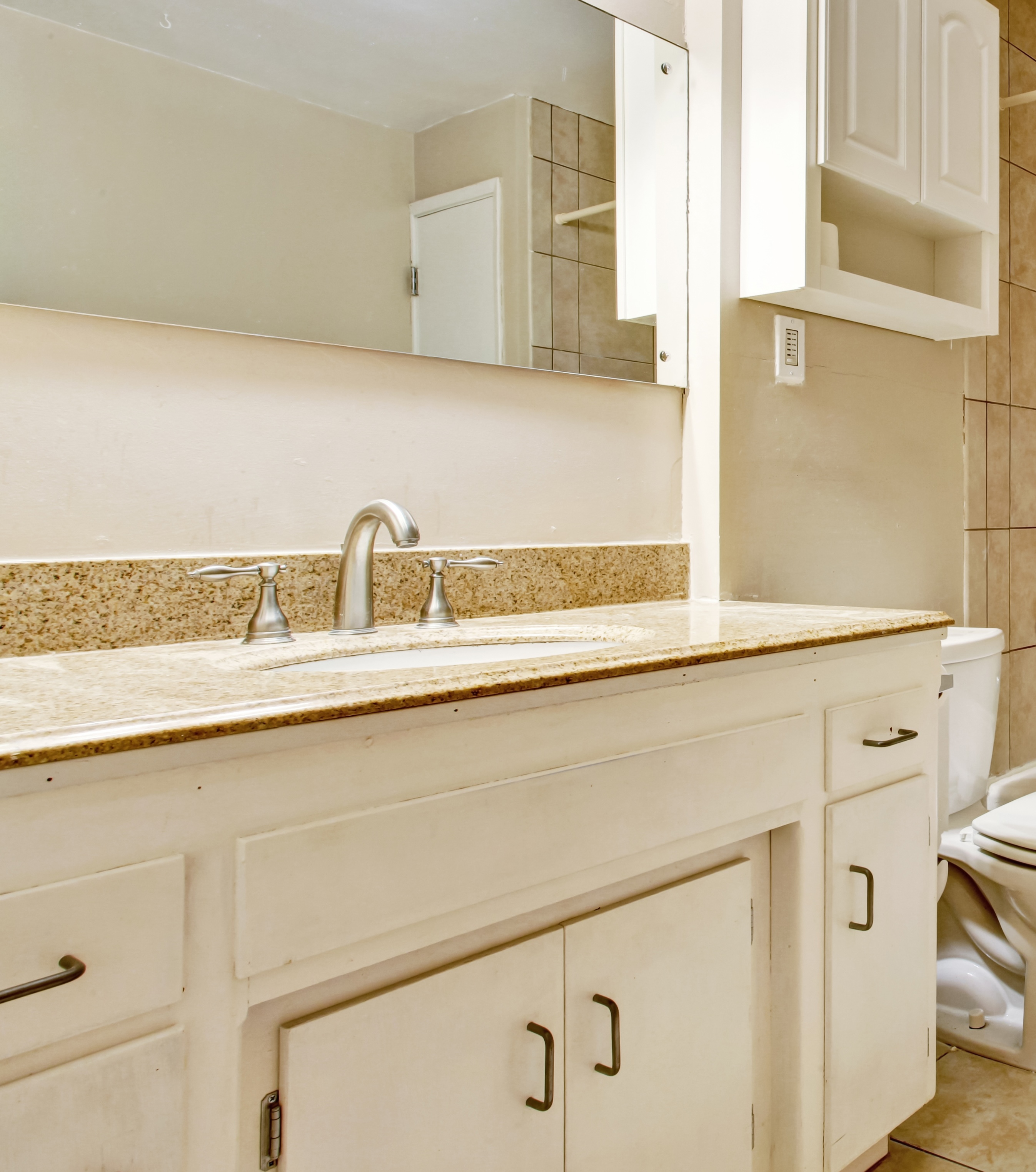 Before - Basic bathroom needing renovation